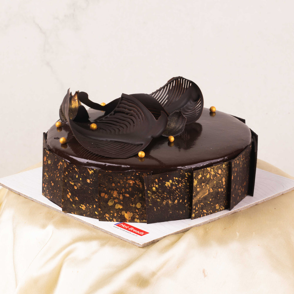Deliver luscious ribbon design chocolate fondant truffle cake to Delhi  Today, Free Shipping - DelhiOnlineFlorists